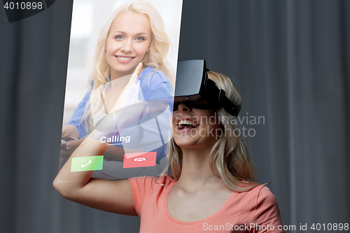 Image of woman in virtual reality headset or 3d glasses