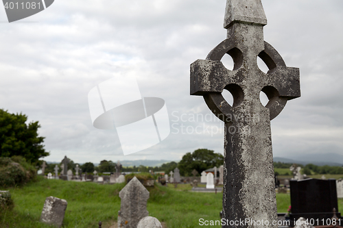 Image of old grave cross on celtic cemetery in ireland