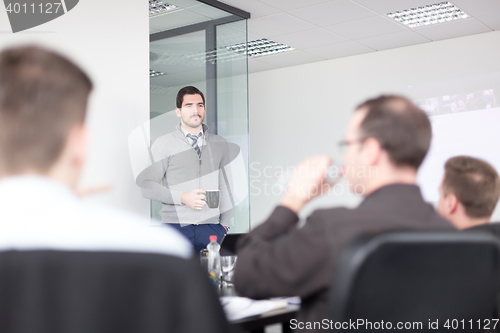 Image of Relaxed informal business team office meeting.