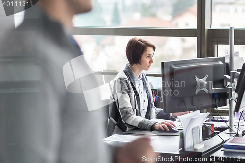 Image of Personal assistant working in corporate office.