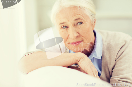 Image of happy senior woman face at home