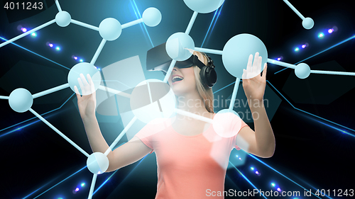Image of woman in virtual reality headset or 3d glasses