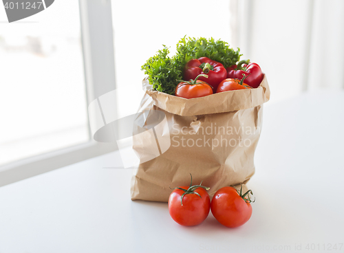 Image of basket of fresh ripe vegetables at kitchen