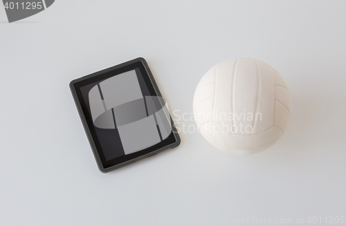 Image of close up of volleyball ball and tablet pc computer