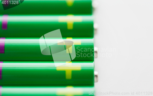 Image of close up of green alkaline batteries