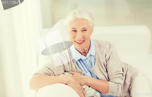 Image of happy senior woman face at home