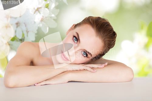 Image of beautiful young woman face and hands