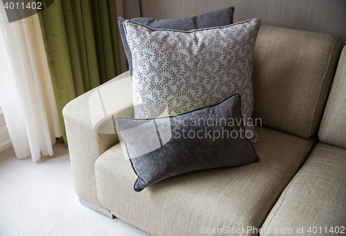 Image of close up of couch with cushions at home