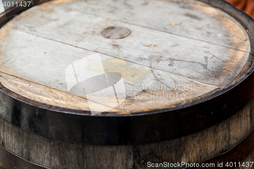 Image of close up of old wooden barrel outdoors