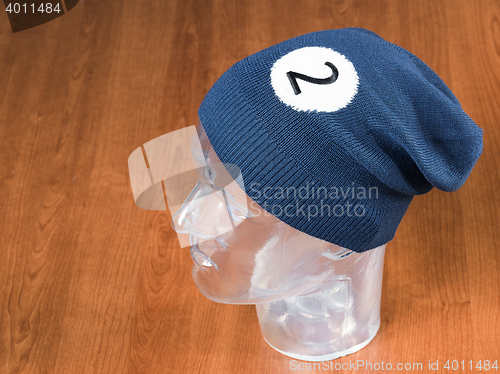 Image of blue woolen handmade cap basketball ball alike