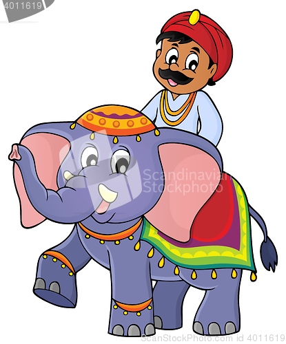 Image of Man travelling on elephant image 1