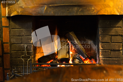 Image of close up of burning fireplace at home