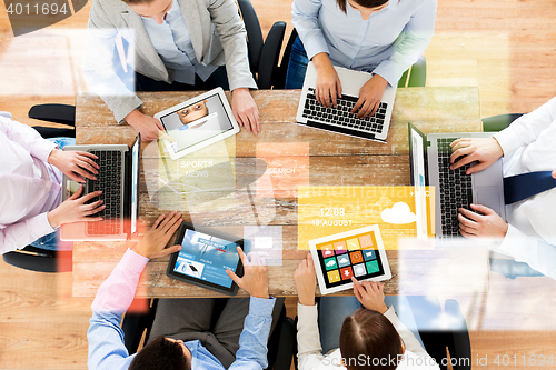Image of business team with laptop and tablet pc computers