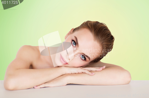 Image of beautiful young woman face and hands