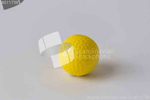 Image of close up of yellow golf ball