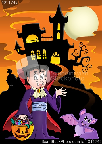 Image of Halloween vampire near haunted house