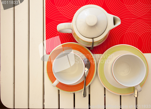 Image of two teacups and teapot