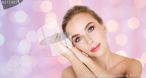 Image of beautiful young woman face and hands