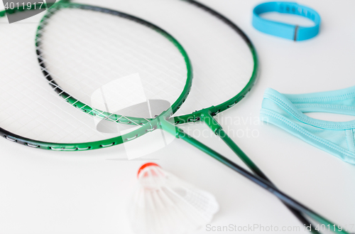 Image of close up of badminton rackets with shuttlecock