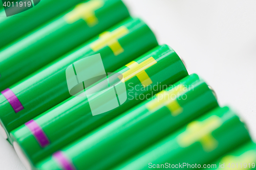 Image of close up of green alkaline batteries