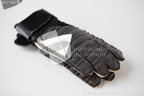 Image of close up of football or soccer goalkeeper gloves