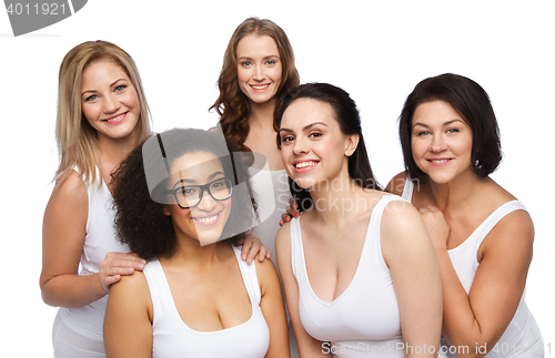 Image of group of happy different women in white underwear