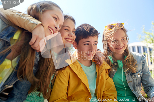 Image of happy teenage students or friends outdoors