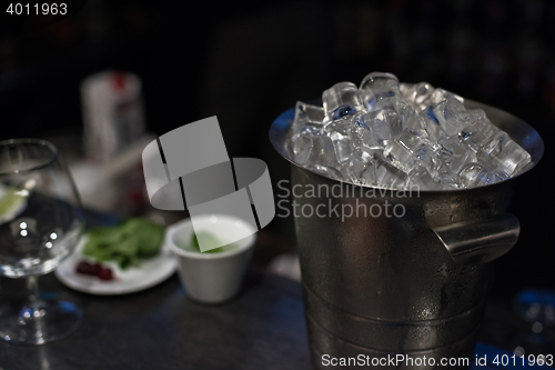 Image of bucket with ice cubes