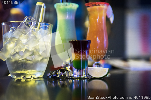 Image of cocktails on bar background