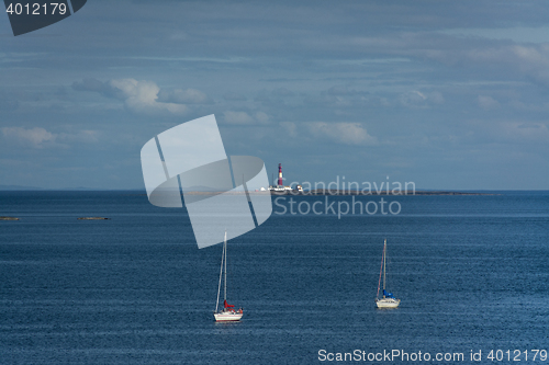 Image of Seascape - Ferder lighthouse and sailboats