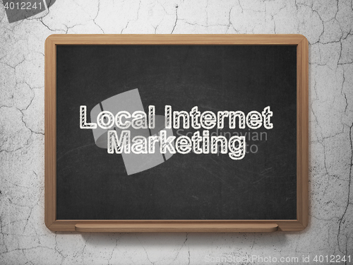 Image of Advertising concept: Local Internet Marketing on chalkboard background
