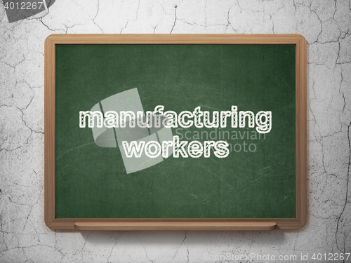 Image of Industry concept: Manufacturing Workers on chalkboard background