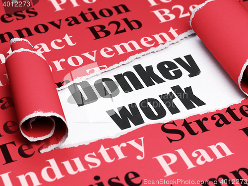 Image of Finance concept: black text Donkey Work under the piece of  torn paper