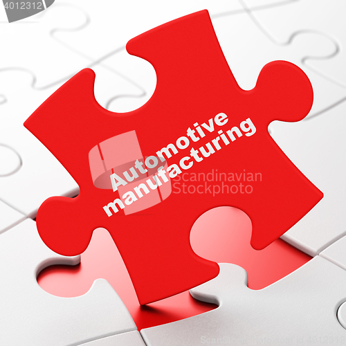 Image of Industry concept: Automotive Manufacturing on puzzle background