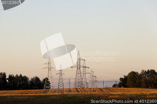 Image of power poles in the field