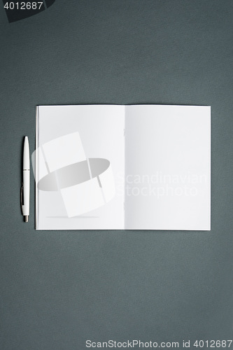 Image of Mock-up business notebook. Gray background.