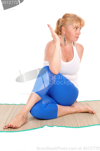 Image of Yoga trainer making poses.