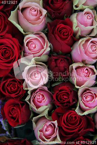 Image of Wedding centerpiece in red and pink