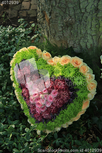 Image of Heart shaped sympathy flower arrangement 