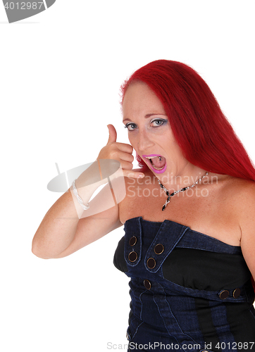 Image of Woman pretending  being on the phone.