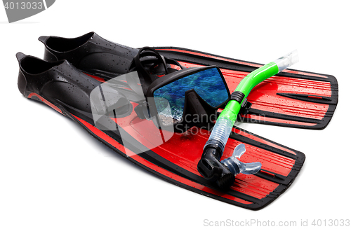 Image of Snorkel, flippers and mask with reflection of blue sea