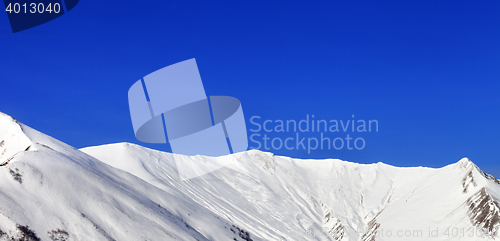 Image of Panoramic view on snowy mountains at nice sun day