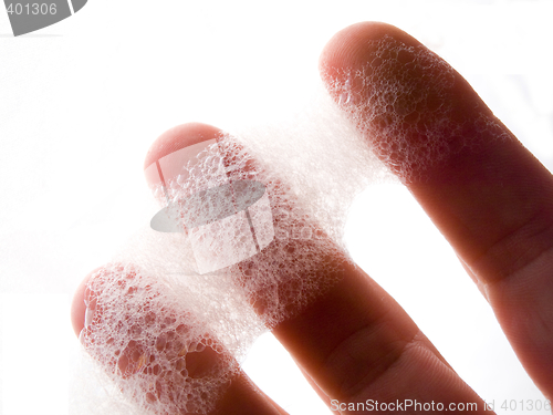 Image of Fingers and soap bubbles