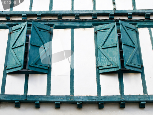 Image of Green wooden wall windows