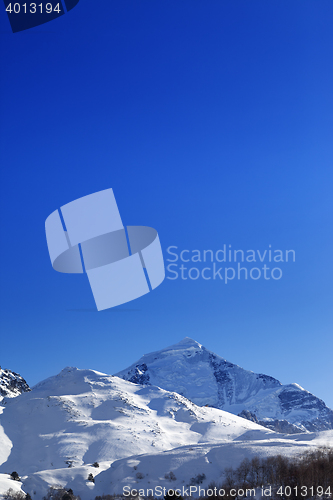 Image of Mount Tetnuldi and off-piste slope in sun morning