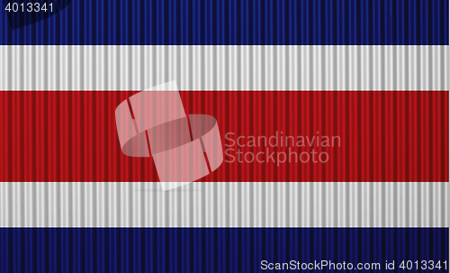 Image of Flag on corrugated iron