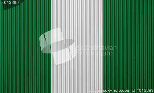 Image of Flag on corrugated iron