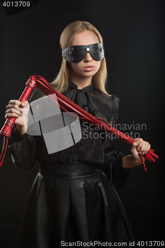 Image of Portrait of young beautiful woman in blindfold