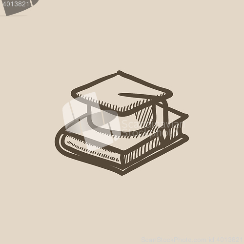 Image of Graduation cap laying on book sketch icon.