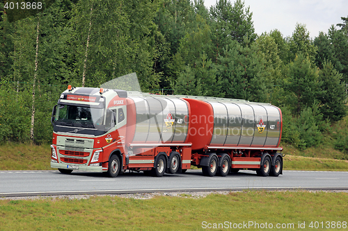 Image of Colorful Volvo FH Tank Truck on Freeway